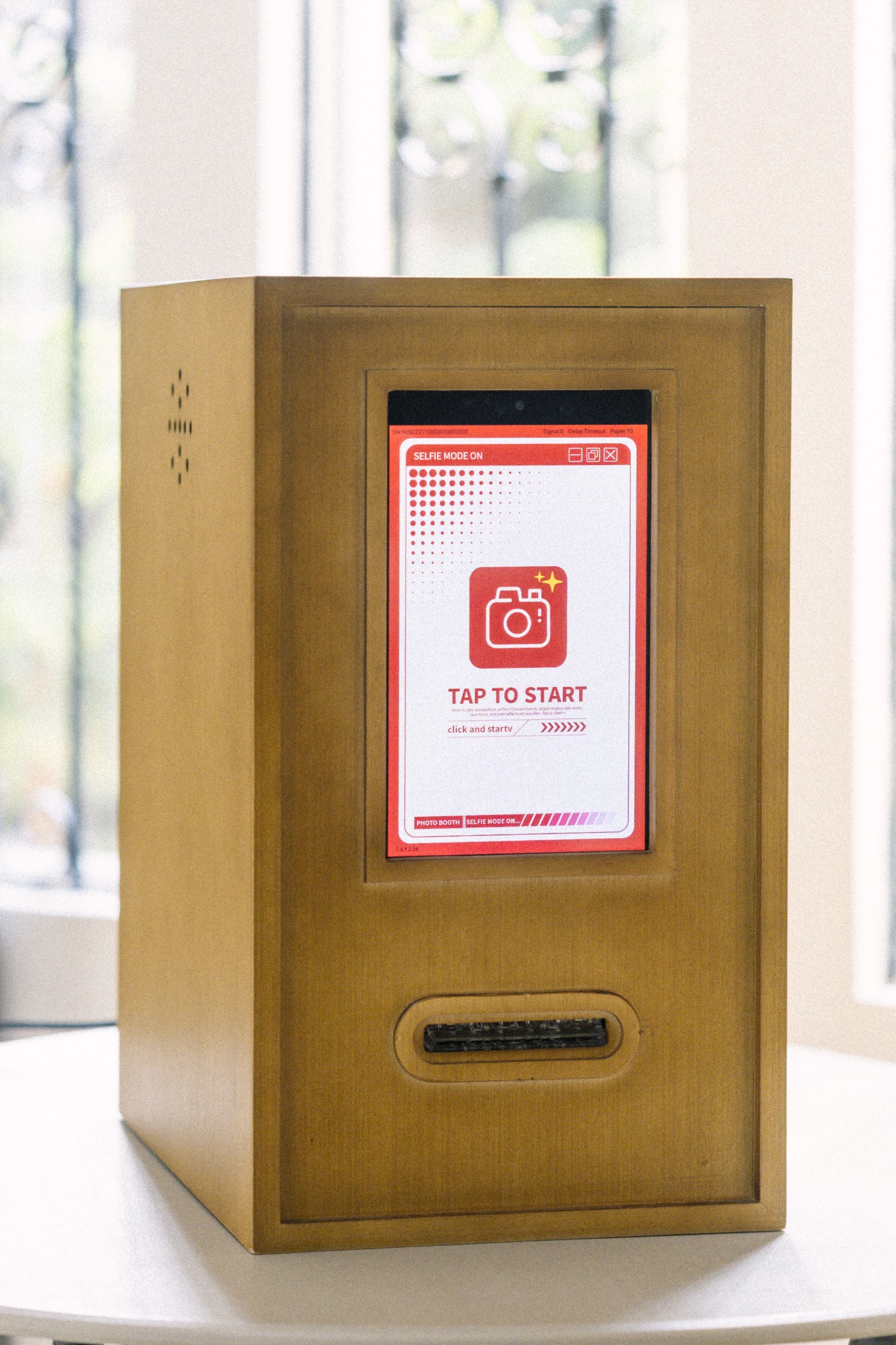The complete Resibooth setup and its receipt-style photographs